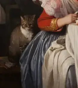 Detalle del gato bajo la mesa en la obra de Bolch